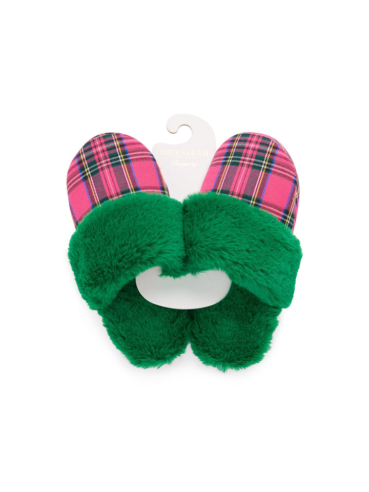 Green faux fur plaid slippers on a hanger