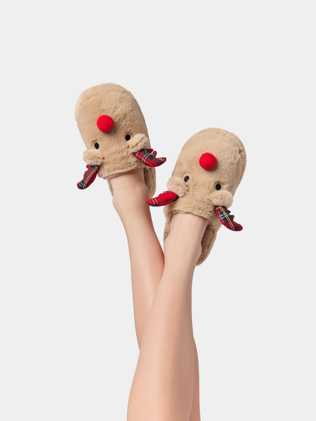 Reindeer slippers with red noses on raised feet