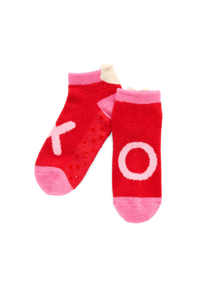 Red XO fuzzy socks with pink letters on white