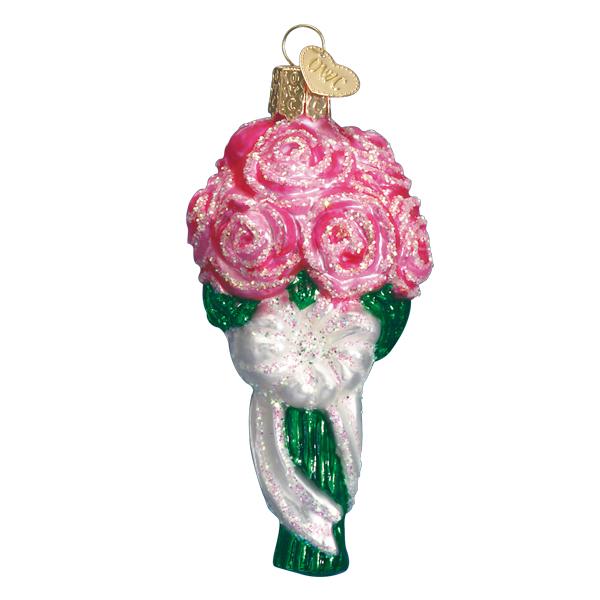 Pink rose bouquet ornament with glittered roses, green leaves, and a white satin ribbon wrap, on white