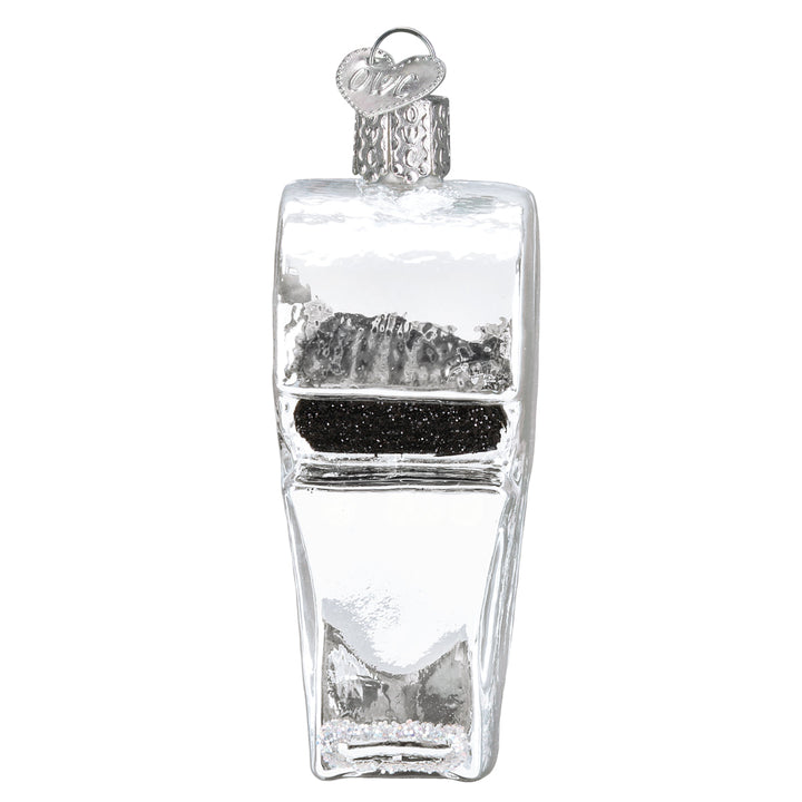 Top view of the whistle ornament looking into its black mouthpiece, on white