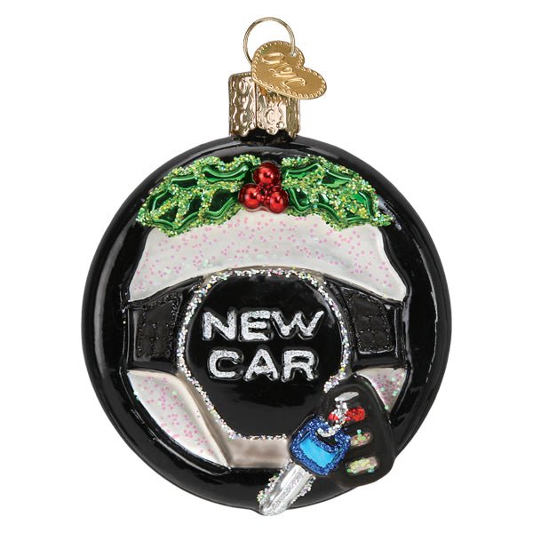 New Car steering wheel glass ornament, front view, black wheel with holly and blue key fob on white