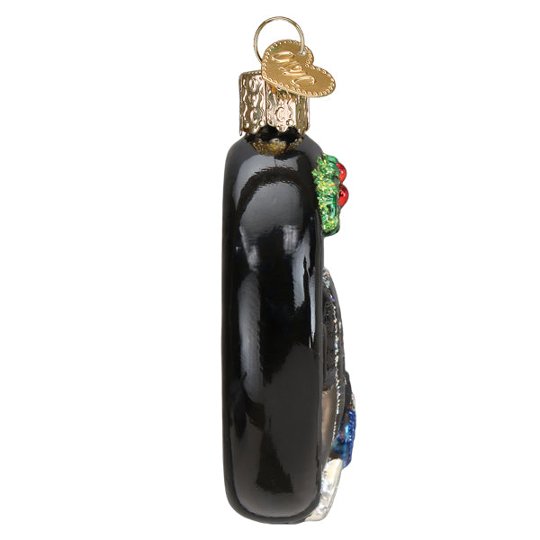 Side view of the New Car steering wheel ornament showing its slim profile and key fob