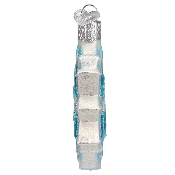 Thin side profile of the snowflake ornament with its frosted white edge