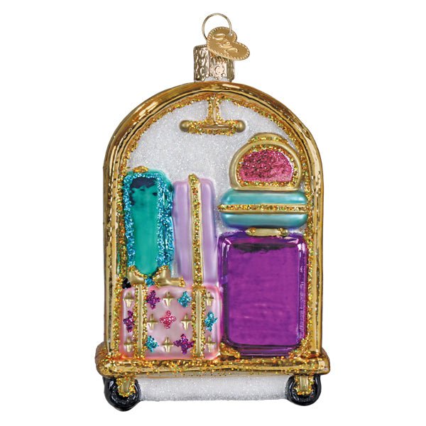 Back view of the luggage cart ornament showing a teal bag and purple suitcase