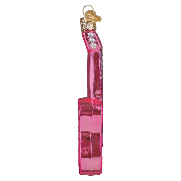 Side view of the pink guitar ornament showing its slim profile and tuning pegs