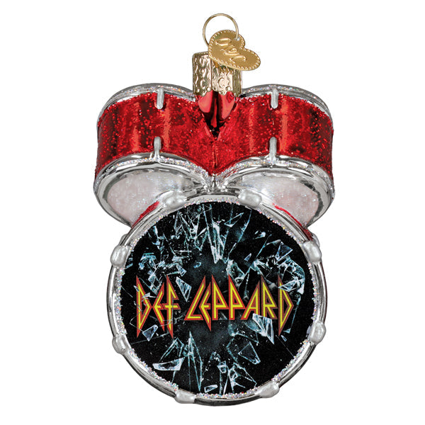 Def Leppard bass drum glass ornament with the band logo, front view on a white background
