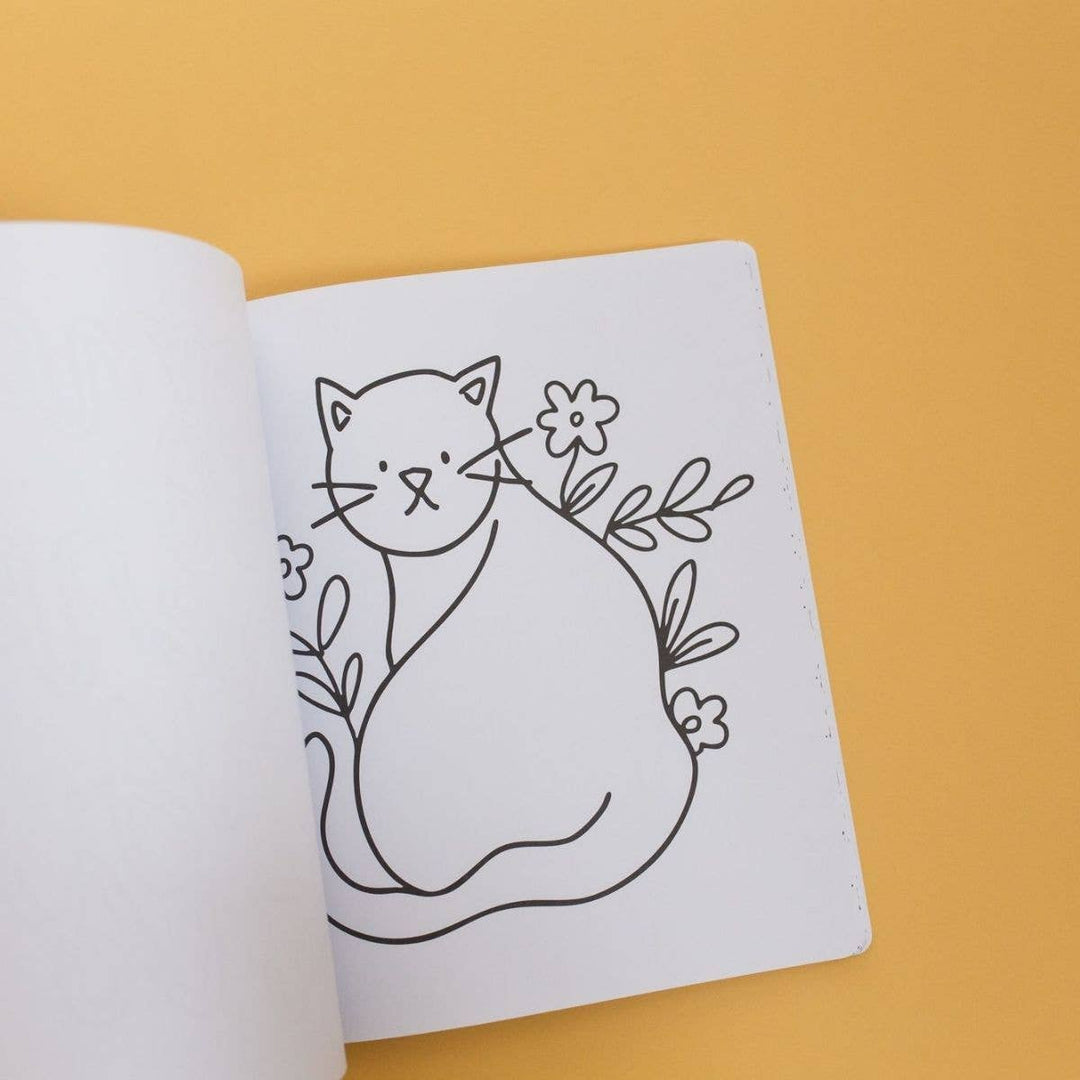 Full-page coloring outline of a fluffy cat with flowers, a rainy day coloring activity