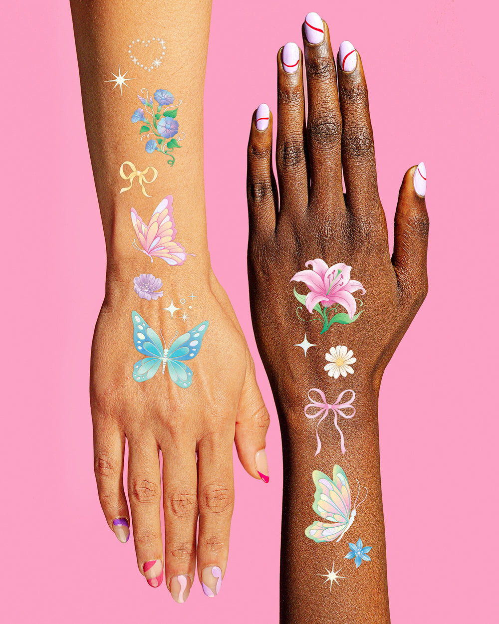 Pastel butterfly and flower temporary tattoos worn on two arms against a pink background