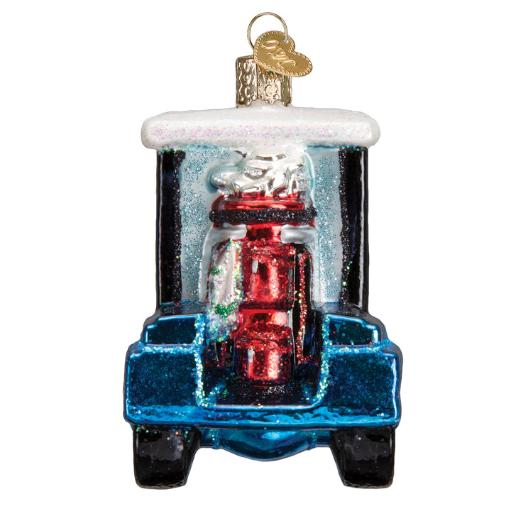 Rear view of the blue golf cart Santa ornament with the red golf bag strapped behind the seat, on white