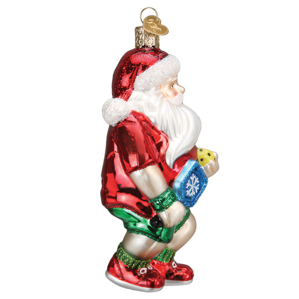 Side of the pickleball Santa ornament in a ready stance with his paddle up