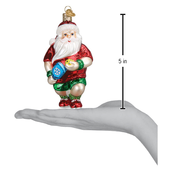 Pickleball Santa ornament on an open palm beside a 5 inch height marker