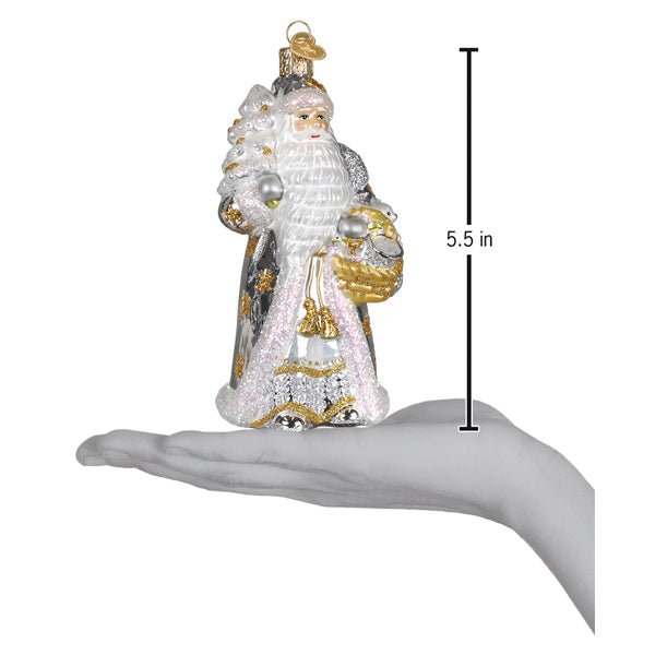 Sterling Santa ornament on an open palm with a 5.5 inch height marker for scale