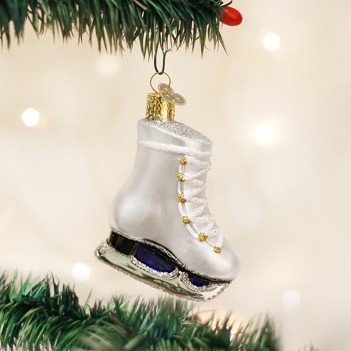 White ice skate ornament with gold details, front view
