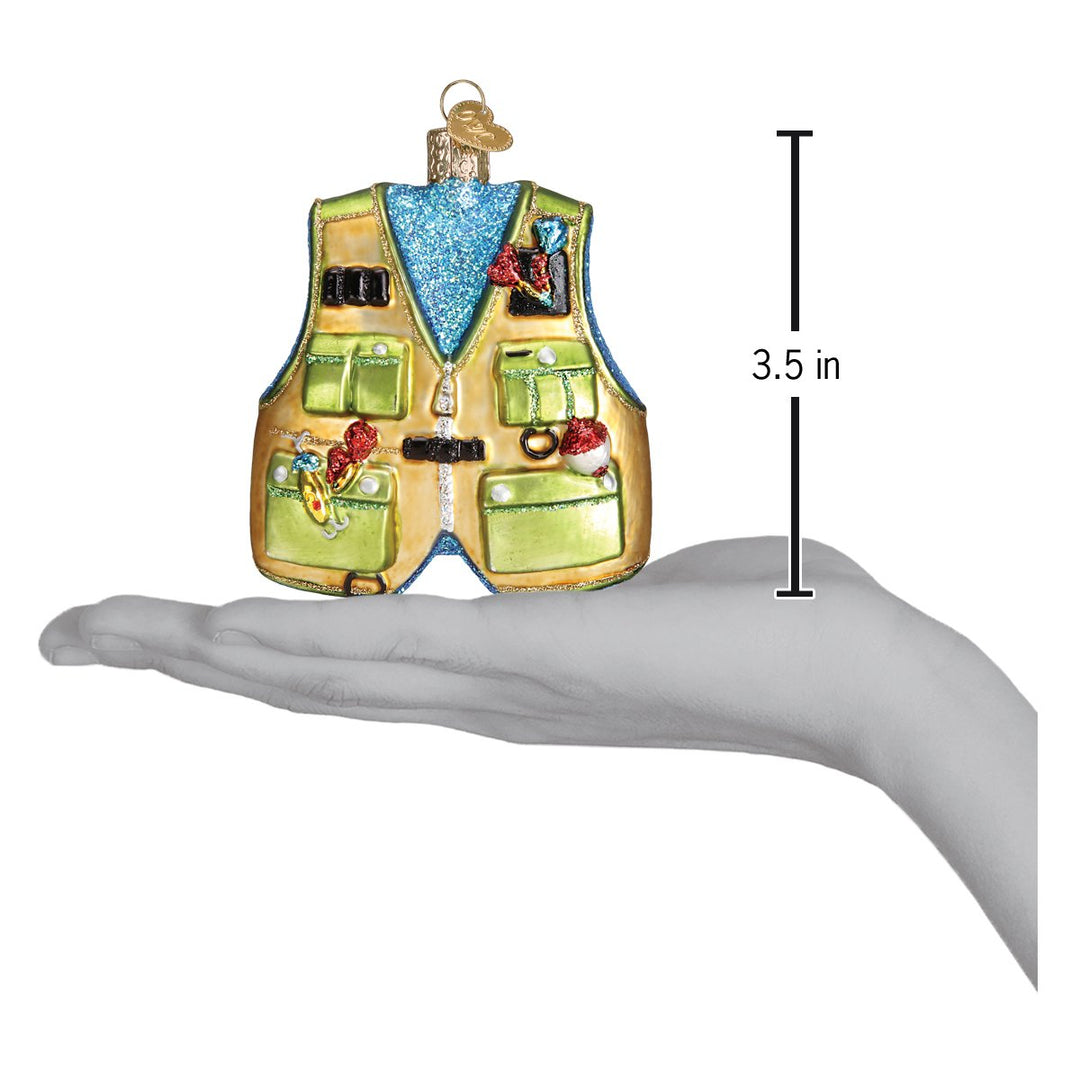 Fishing vest ornament on an open palm beside a 3.5 inch height marker