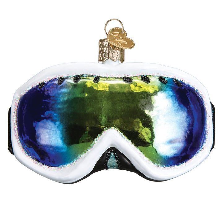 Ski goggles glass ornament with white frame and mirrored blue-green lens, front view on white