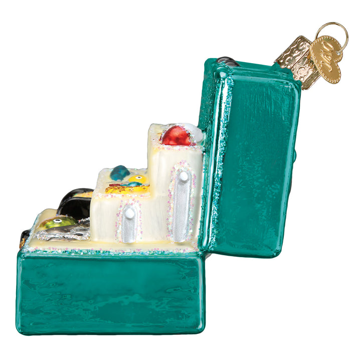 Side view of the open tackle box ornament with the lid raised and tray lifted, on white