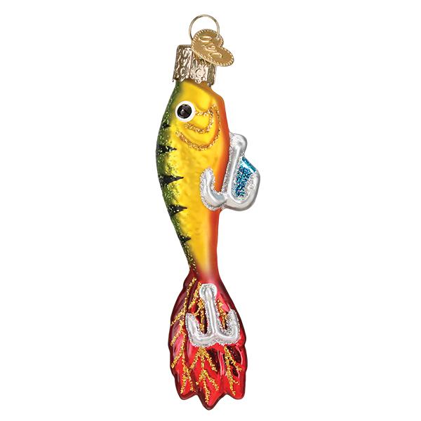 Side profile of the yellow and orange fishing lure glass ornament with painted eye and silver hooks, on white