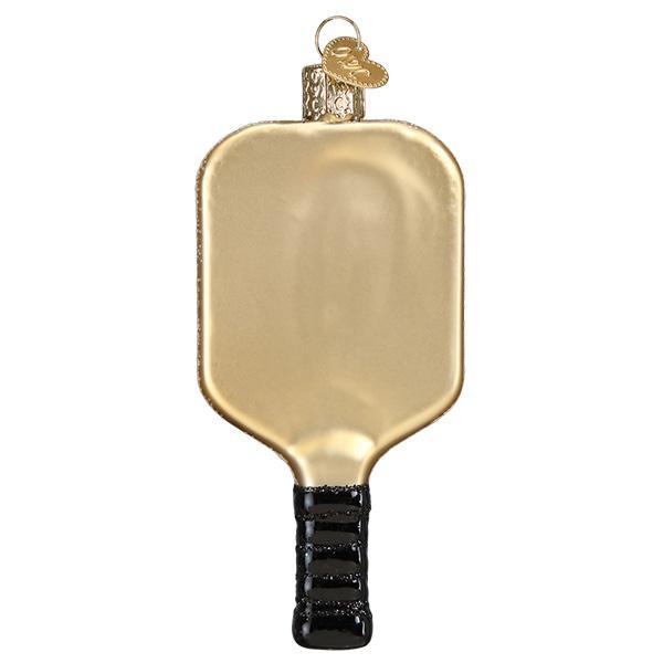 Back of the pickleball paddle ornament with a plain gold face and black grip, on white