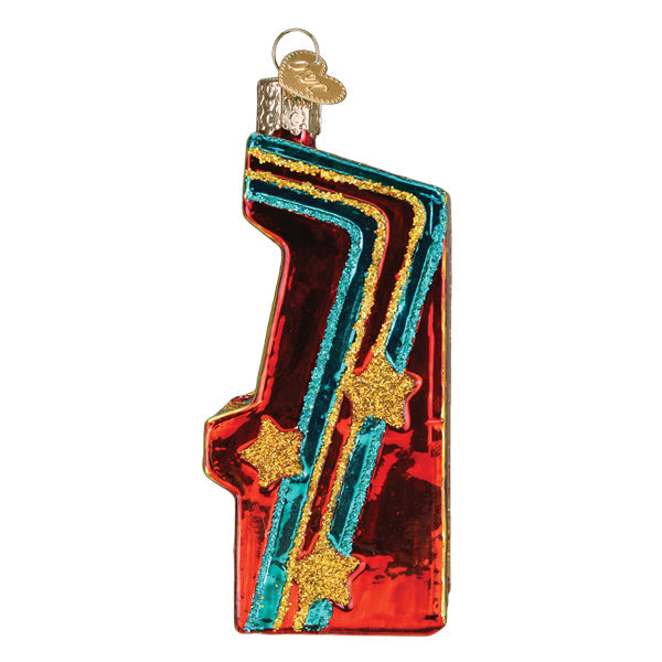 Side view of the red and blue arcade game ornament on a white background