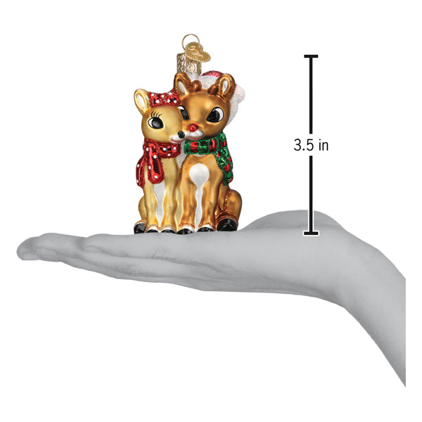 Rudolph and Clarice ornament on an open palm with a 3.5 inch height marker for scale