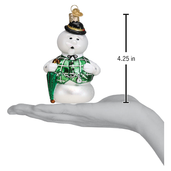 Sam the Snowman ornament on an open palm beside a 4.25 inch height marker
