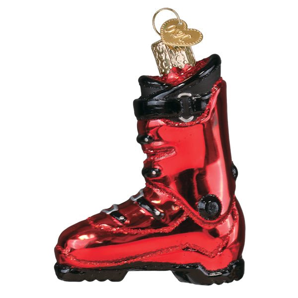 Inside view of the red ski boot ornament showing the black ankle hinge and smooth shell, on white