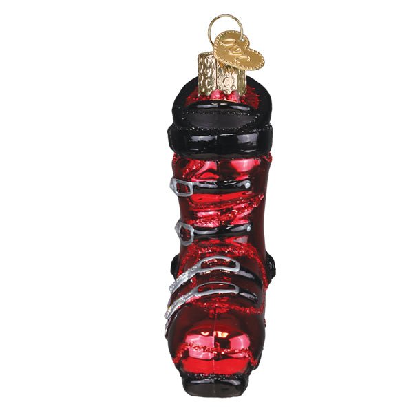 Front view of the red ski boot ornament with silver buckles stacked down the shin, on white