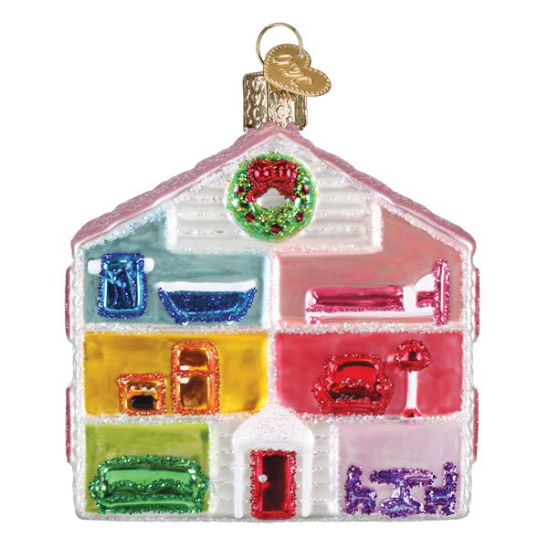 Open front of the dollhouse ornament showing six colorful rooms of tiny furniture under a pink roof, on white