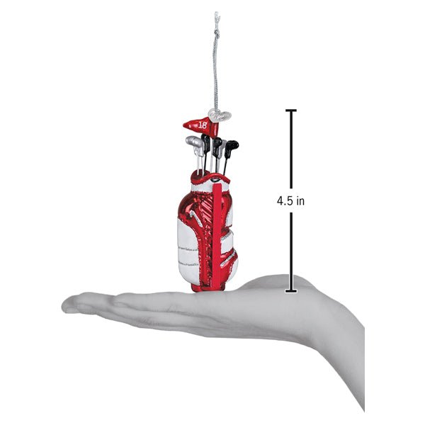 Golf bag ornament above an open palm next to a 4.5 inch height marker