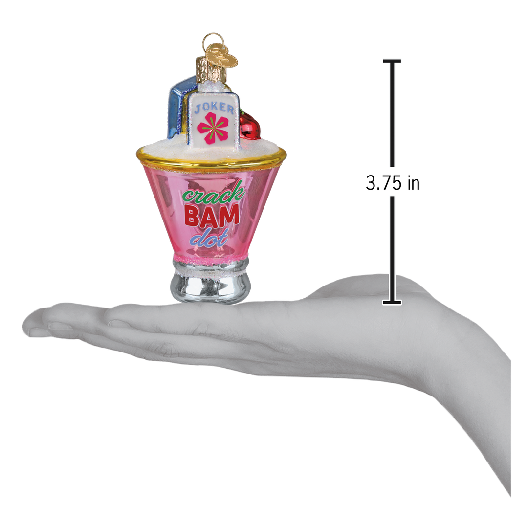 Mahjong martini ornament on an open palm next to a 3.75 inch height marker