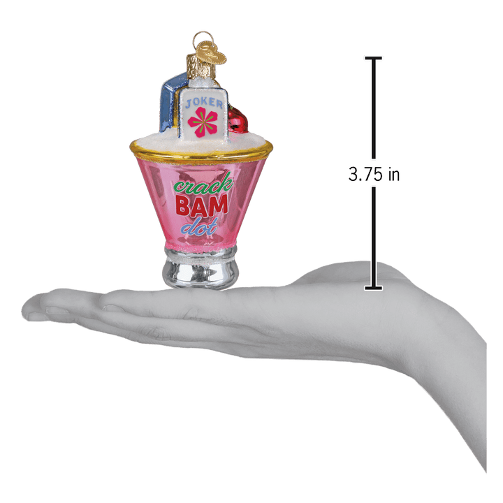 Mahjong martini ornament on an open palm next to a 3.75 inch height marker