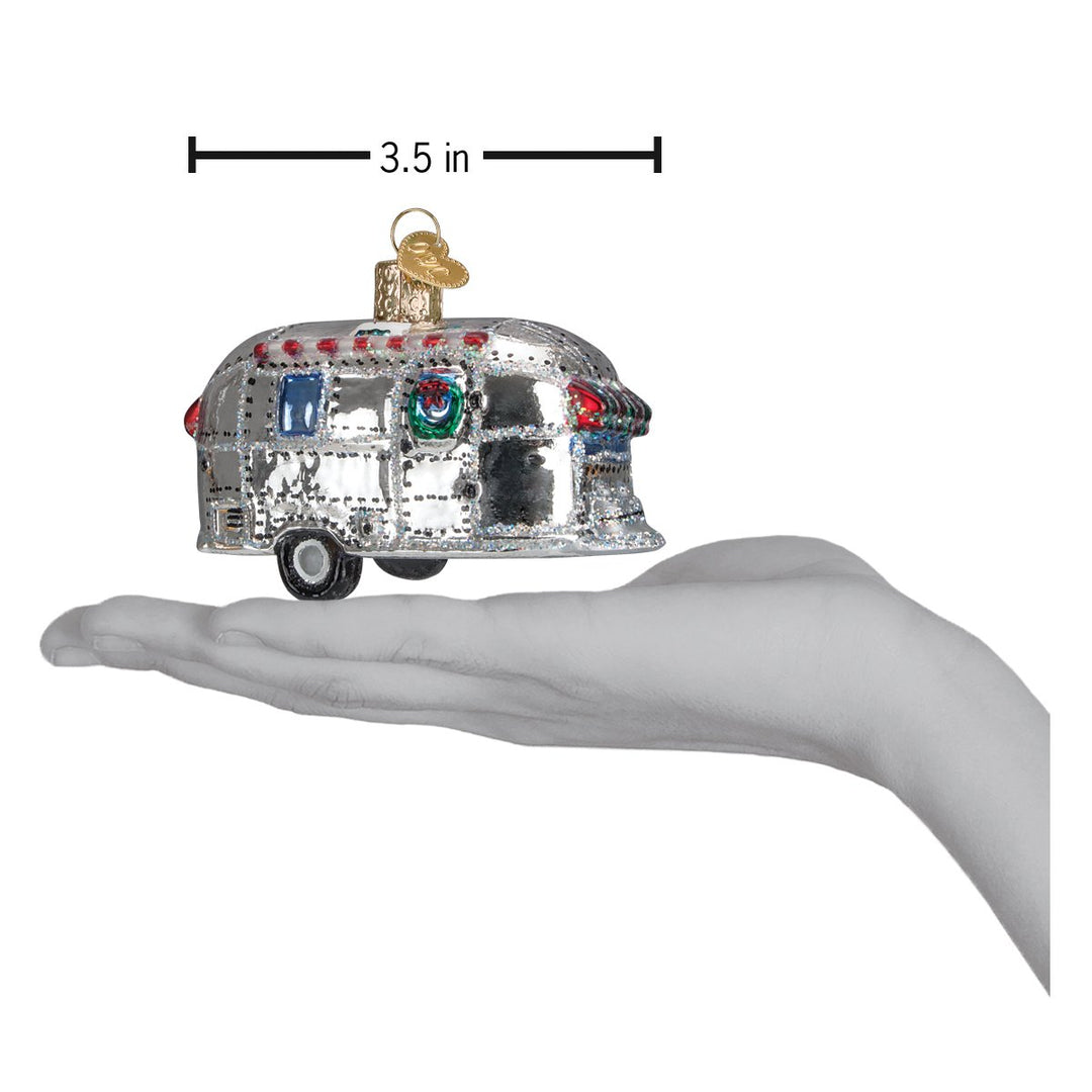 Second angle of the silver camper trailer ornament on a white background