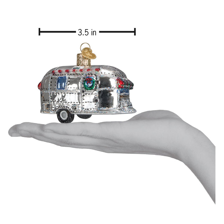 Second angle of the silver camper trailer ornament on a white background