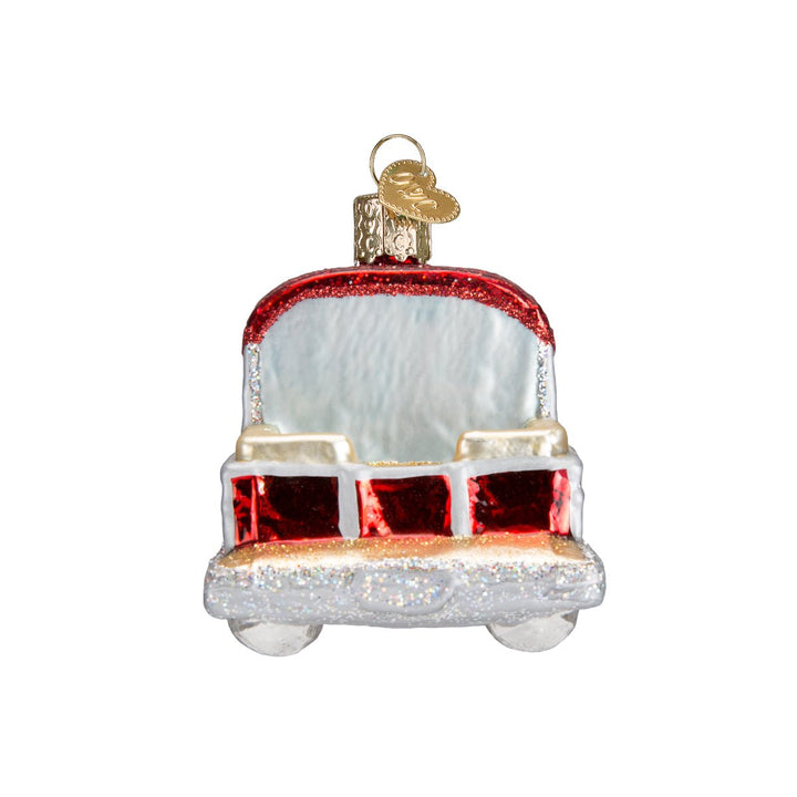 Bow view of the pontoon boat ornament showing the red canopy and front seating, on white