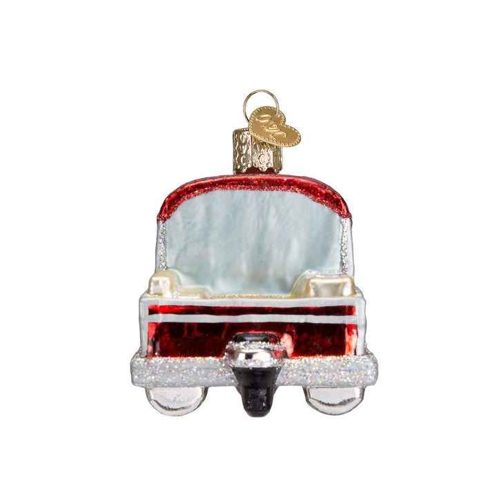 Stern view of the pontoon boat ornament with a black outboard motor under the red canopy, on white