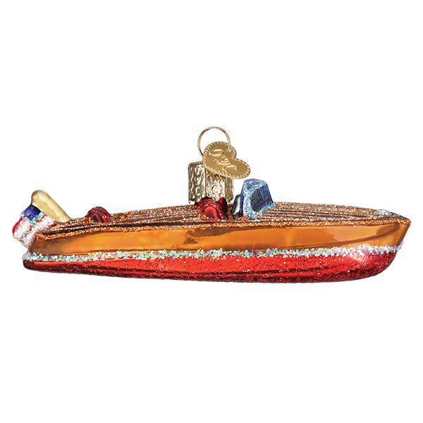 Opposite side of the wooden boat ornament with a small flag at the stern and silver glitter trim, on white