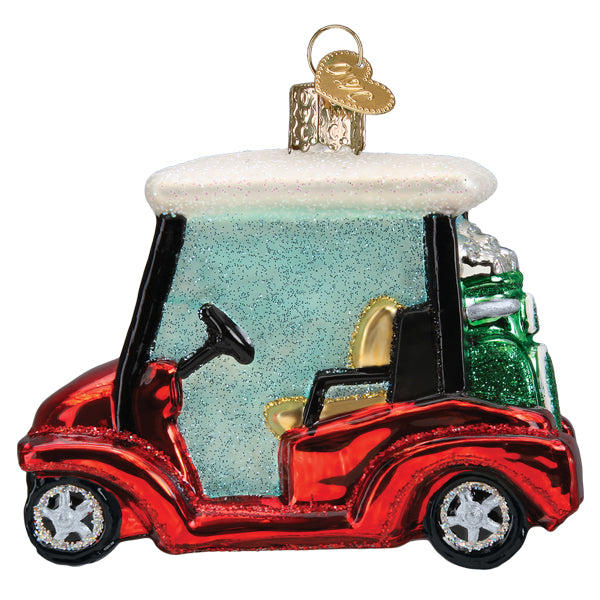 Red golf cart glass ornament with white roof, aqua windshield, and green golf bag, side view on white