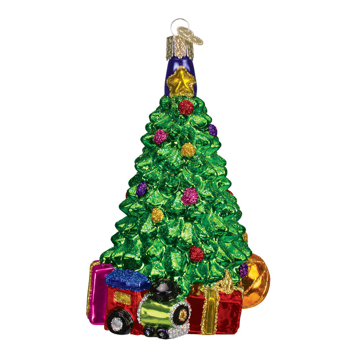 Christmas morning tree ornament with a gold star, toy train, teddy bear, and gifts at its base, on white