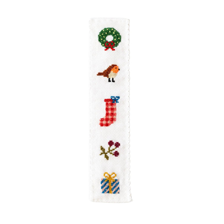 Christmas cross stitch bookmark with wreath, robin, stocking, berries, and present