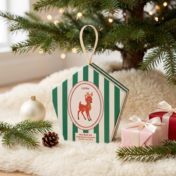 Green striped deer box under the tree on a sheepskin rug with wrapped gifts, a Christmas morning surprise