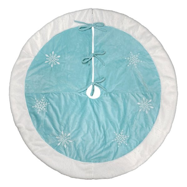 Pastel blue round tree skirt with white embroidered snowflakes and faux fur trim, flat overhead view