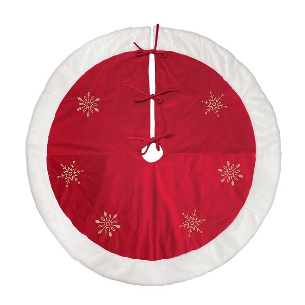 Red round tree skirt with gold embroidered snowflakes and white faux fur trim, flat overhead view