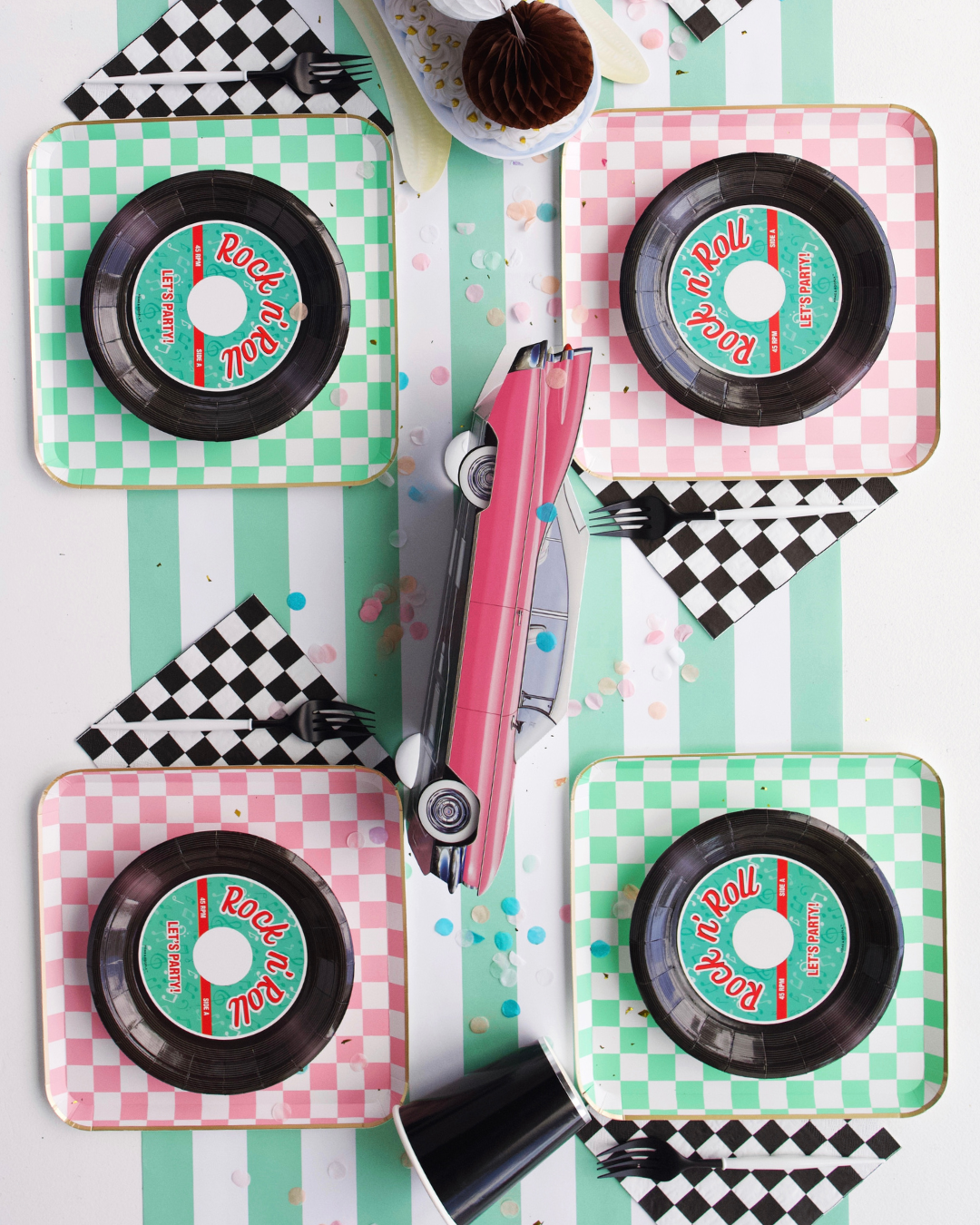 1950s party retro diner theme rockabilly decorations poodle skirts jukebox colors pink and teal