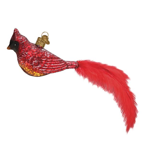 Side view of the vintage mercury glass cardinal ornament with a long feathery red tail, on white