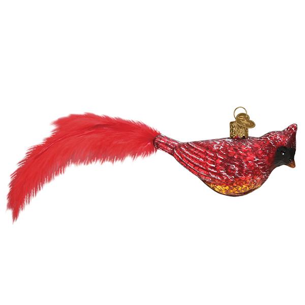Other side of the vintage cardinal ornament showing its antiqued red finish, on white