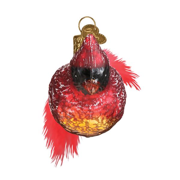 Front of the vintage cardinal ornament with a black mask and red tail fanning behind