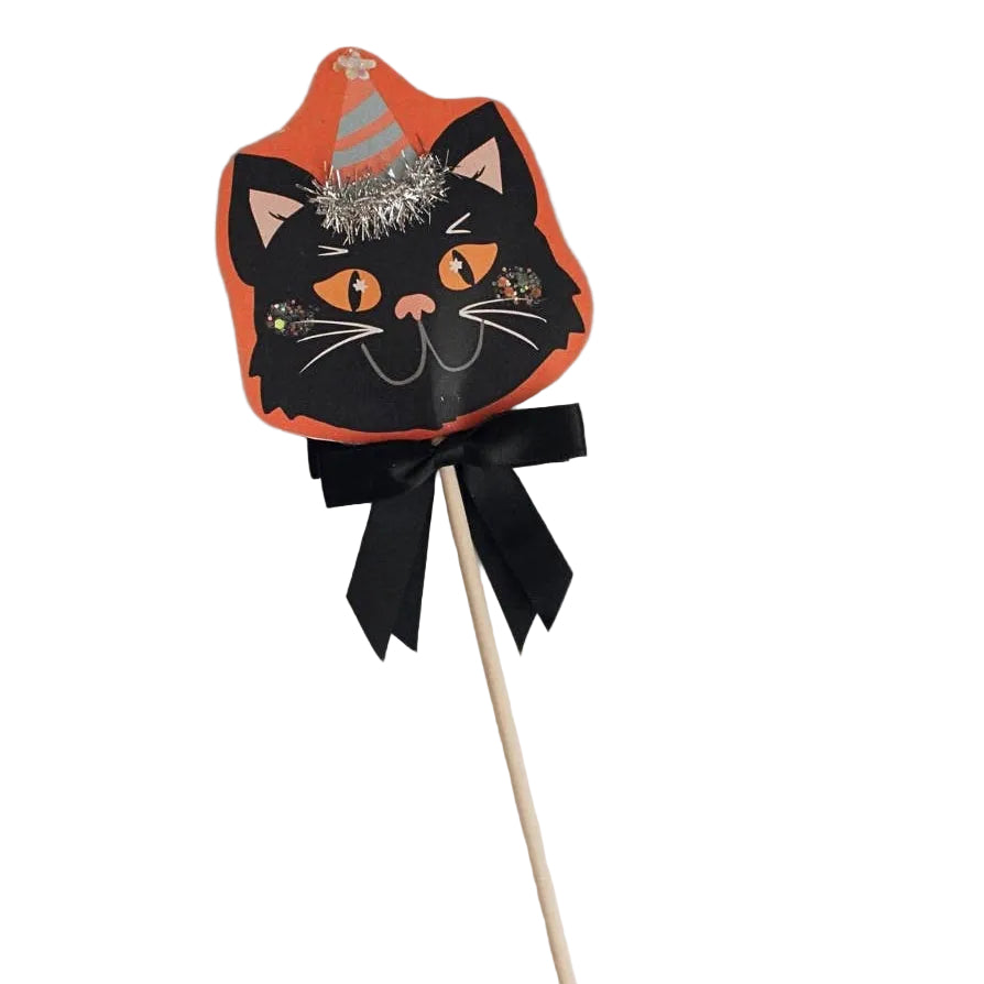 Full view of the black cat Halloween wand on a wooden dowel with black bow, sized for a photo booth prop