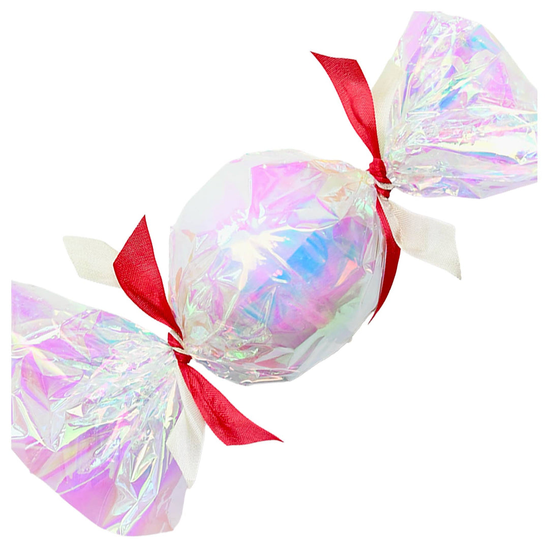 Pearl white bon bon surprise ball in iridescent wrap with red and ivory ribbons for a stocking stuffer
