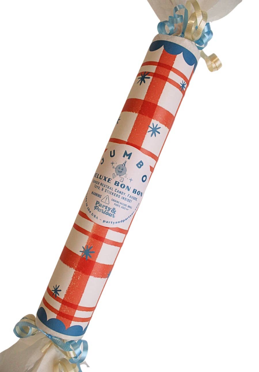 Angled view of the red plaid jumbo bon bon showing blue snowflake stars and scalloped ends for gifting